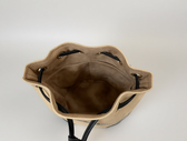 Reimagined Elegance: The Dior Bucket Bag Redux